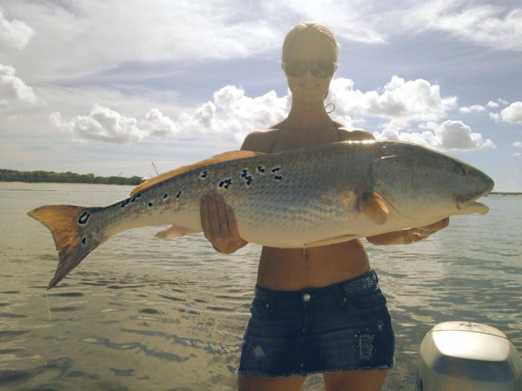 Angel Maria Robertson with one of the prettiest Reds we've seen in awhile caught out of Jacksonville, FL off a half of a blue crab! Nice Job!!!!