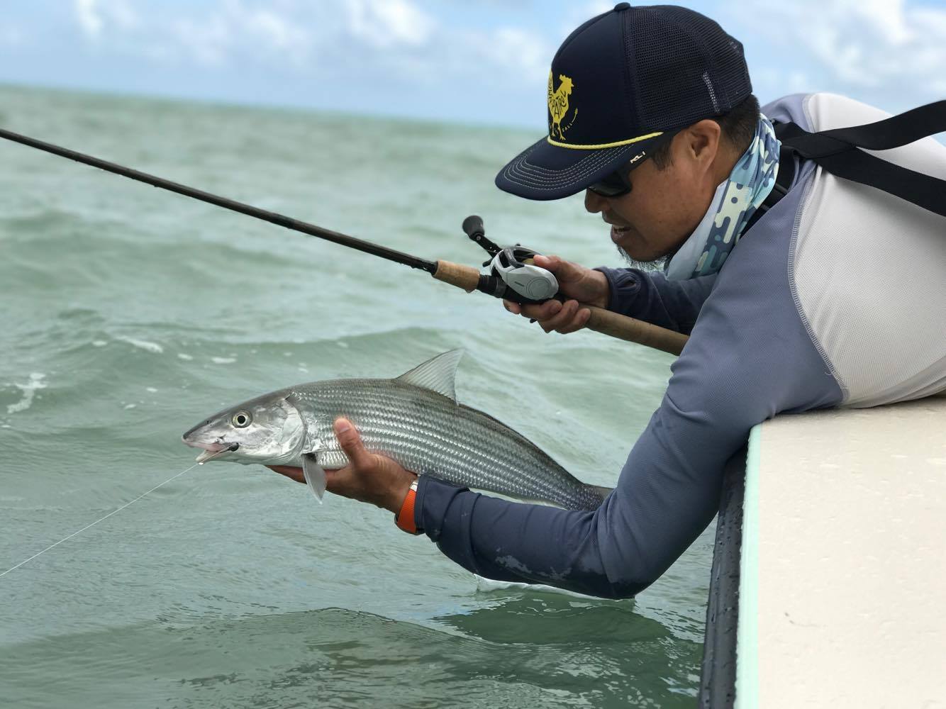 Capt. Honson Lau with a choice Bonefish