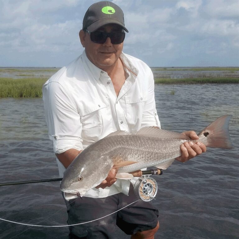 29 inch redfish in super shallow water                         …