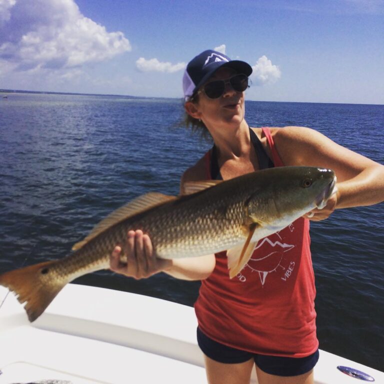 Lady Luck on her personal record redfish!