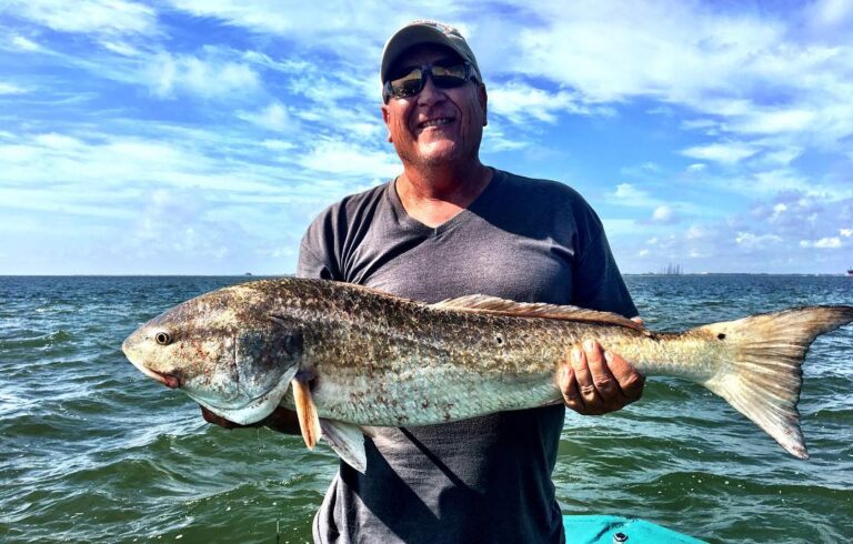 Spirit Airlines Captain Richard with his first Redfish, a 39″ Bull.