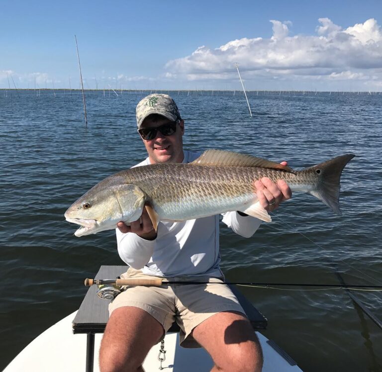 Sore lipping redfish on the fly