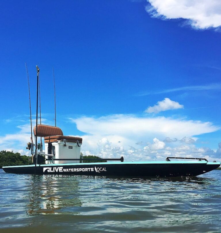 Custom Seafoam deck and black hull with teak accents is definitely a favorite  …