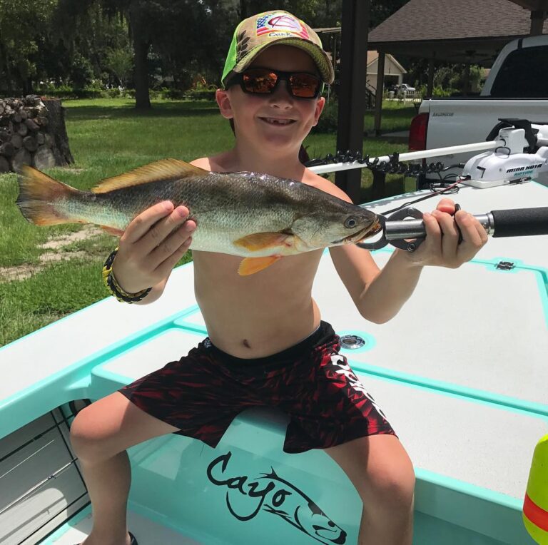 Little man with his first trout ever.    …