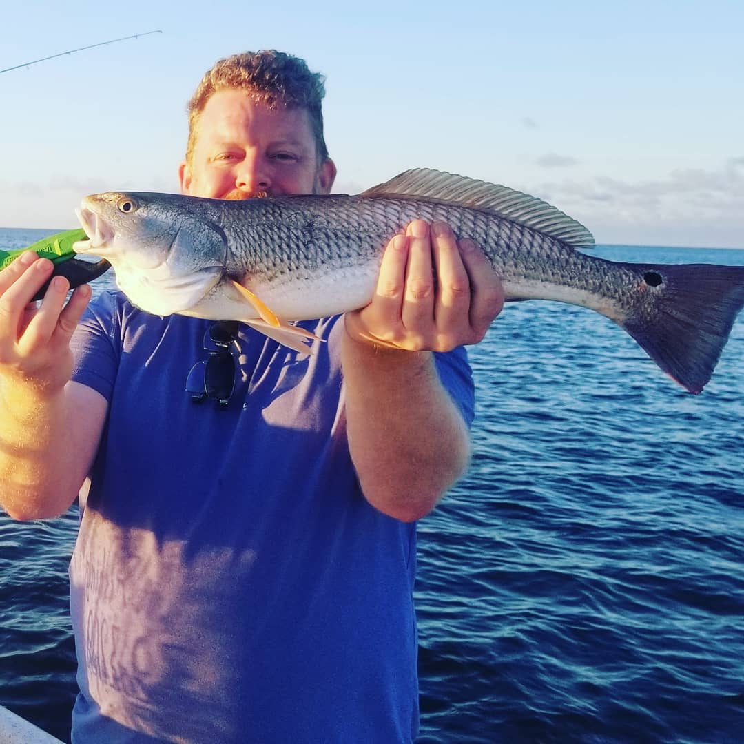 Craig with his first ever redfish.