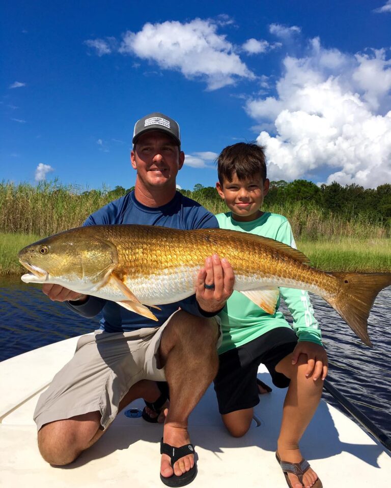 and critter puttin the hurt on some big bull reds today! Watching these things