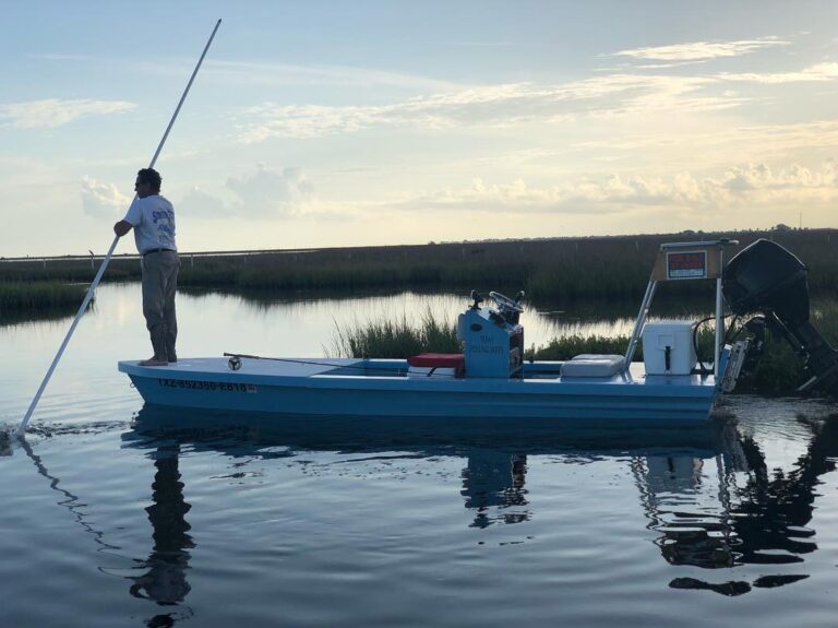 Capt Lamar Scott – Creeping up on some reds, solo poling and ready to cast.