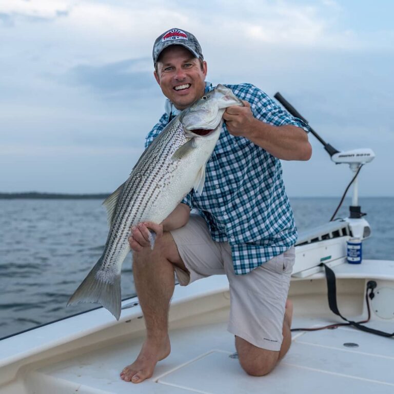 10.32lbs and longer than the ruler on a 50qt  Call it 30″.  

PC: