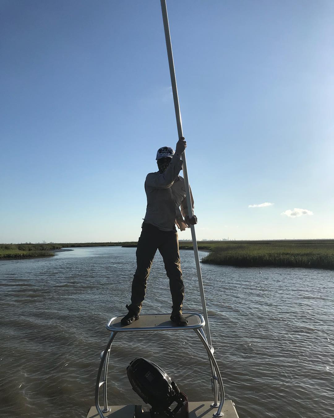 First time poling the new skiff. Lowest of low tides and the boat was still floa