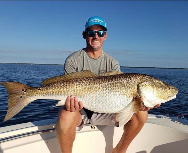 @sirpoppenz with @licking_tails reeling in a 50” bull!