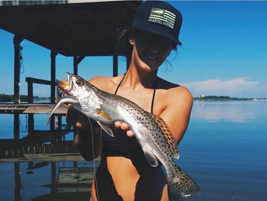 raking up the gator trout under the dock lines