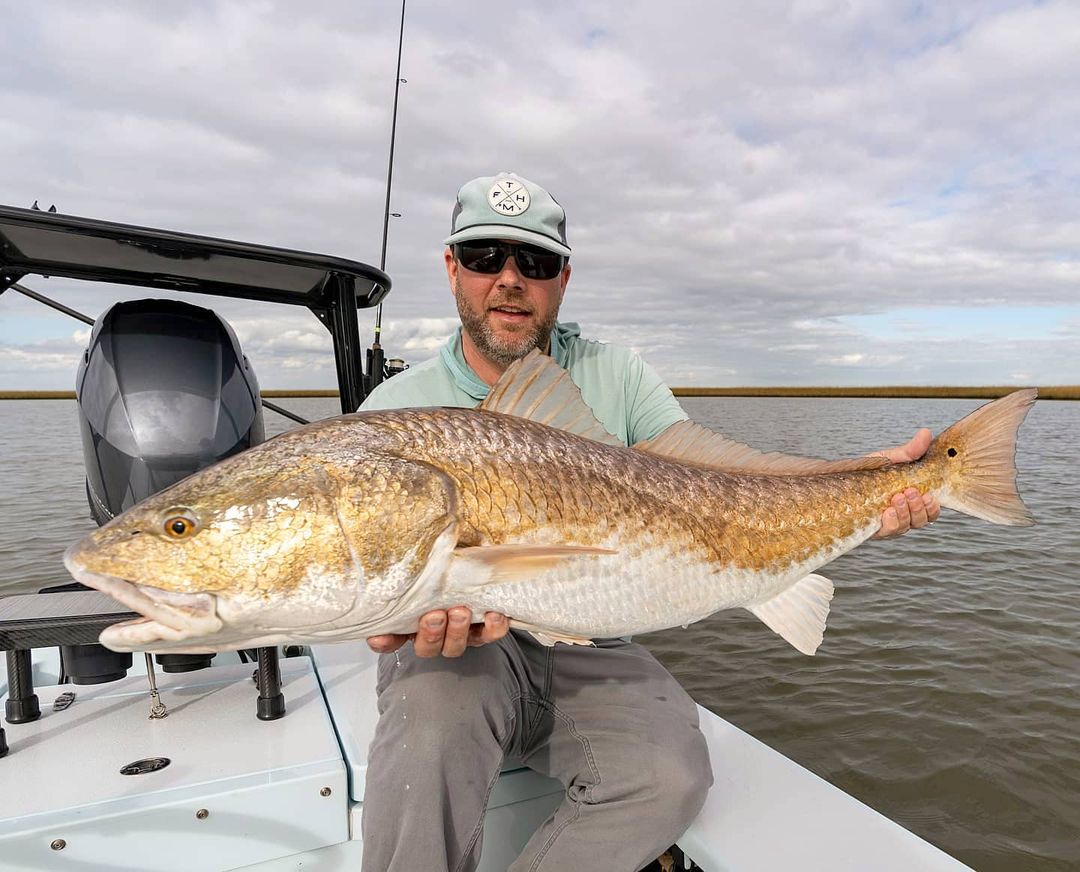 Grip n Grin.
.
Could see this big girl crawling down the bank from accross the p