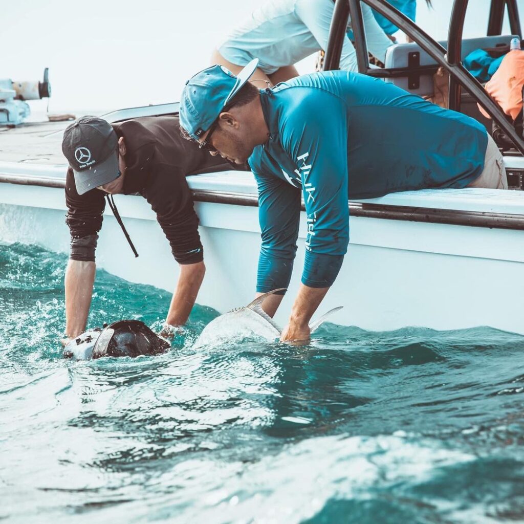 Captain James Marko of Goliath Fishing Charters ( in Ft. Myers, FL doing work. C