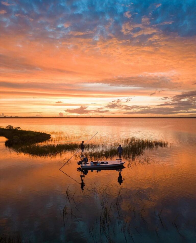 @captainmorros poling the Hells Bay Waterman through an awesome sunset!  DM / …